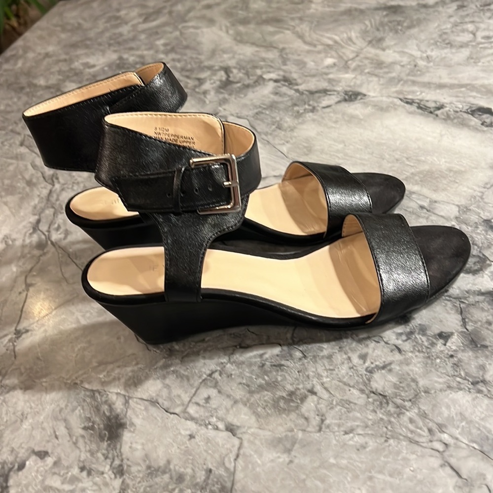 Nine West peppermint wedge, size 8.5 M. 2” heel. Adjustable thick ankle strap.